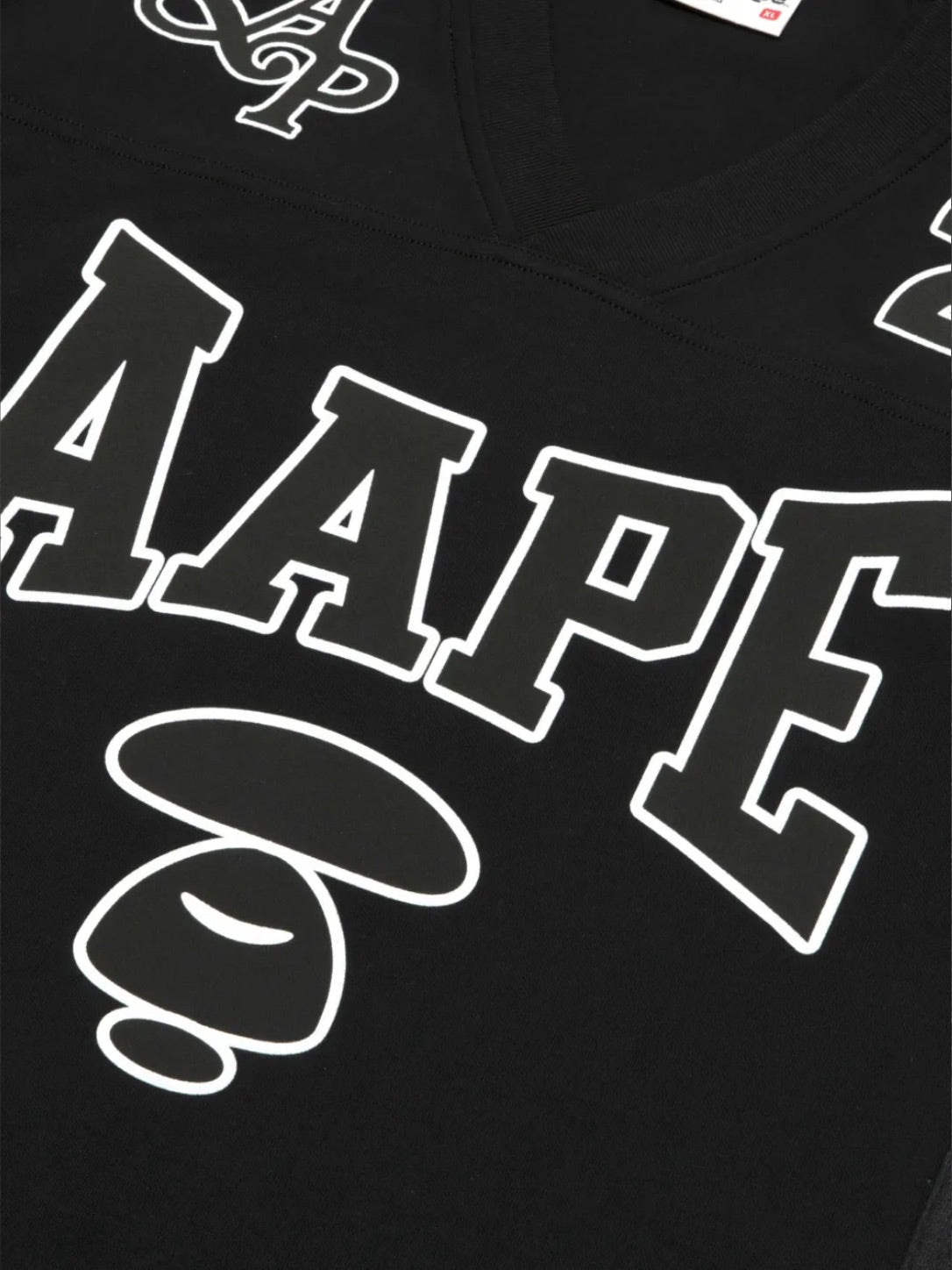 AAPE “MOONFACE VARSITY TEE”